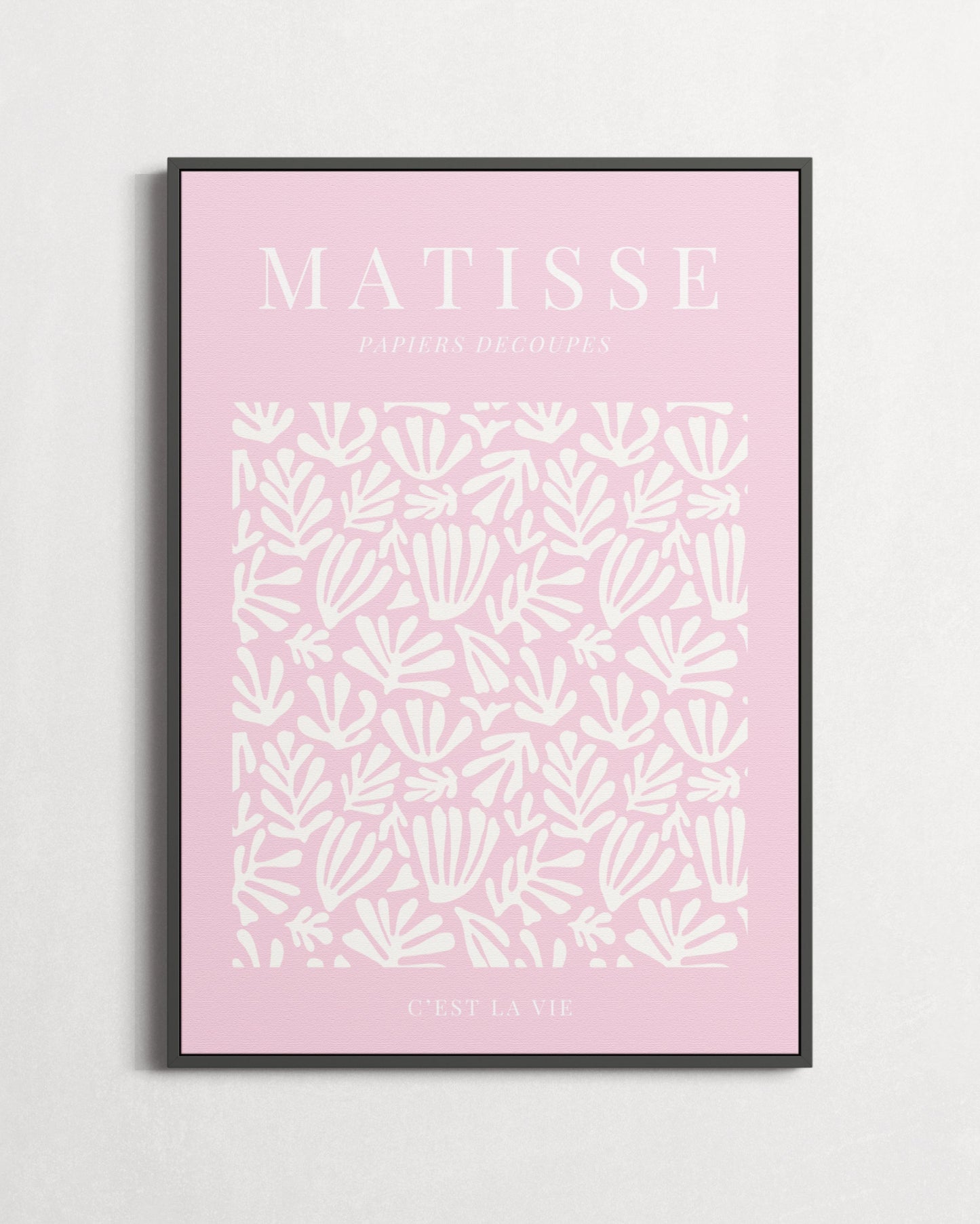 Framed artwork with 'Matisse' text on a pink background