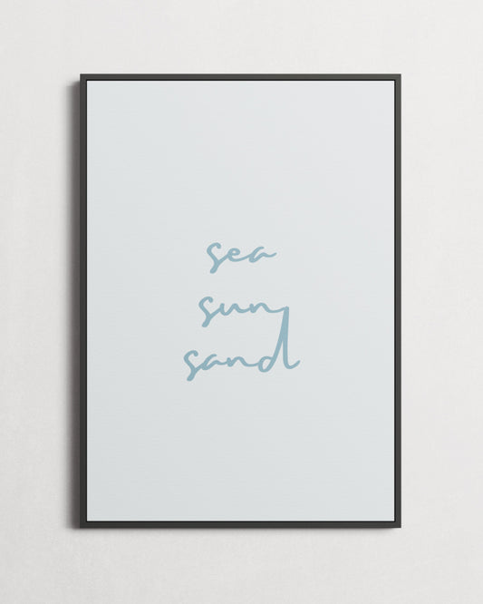 Framed artwork with 'sea sun sand' text on a light gray background